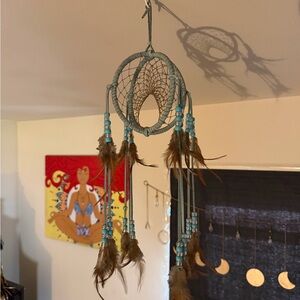 Handcrafted Teal Dreamcatcher with Beads and Feathers